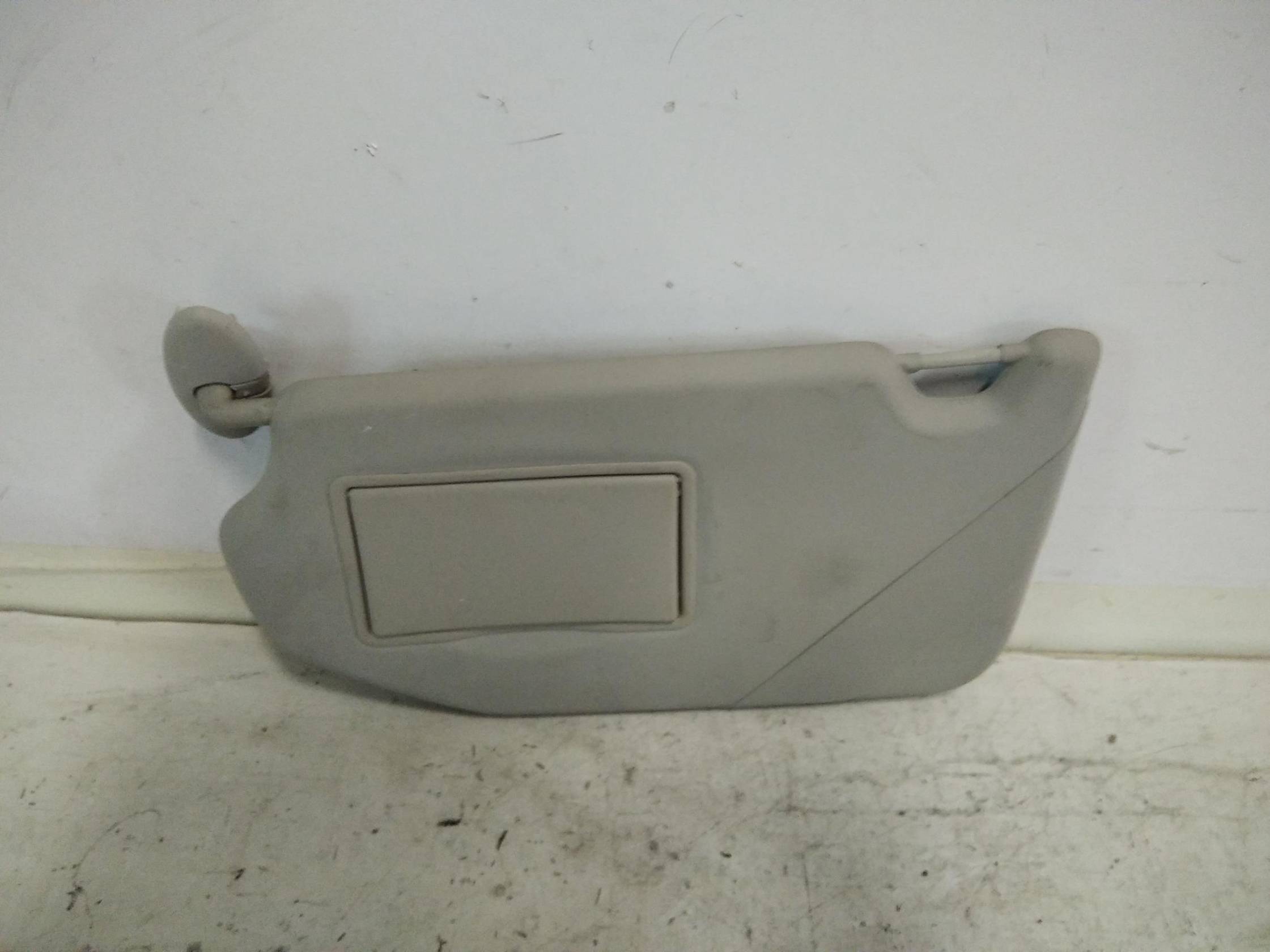 Aletta parasole parabrezza sx.